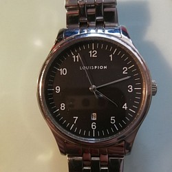 Louis Pion, quartz, date, acier, étanche 50 mètres, pile neuve. Sans boite papier.  30 €