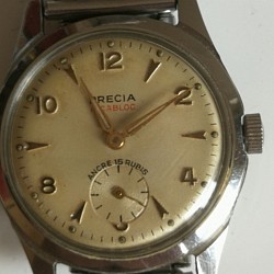 Précia, mécanique manuelle, tout acier, diamètre 32 mm hors couronne. Sans boite papier.  50 €